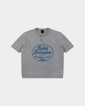 Kaleb A. Bearden Blakely Henley Tee in soft fabric, featuring a buttoned neckline and casual fit, shown in a neutral color.