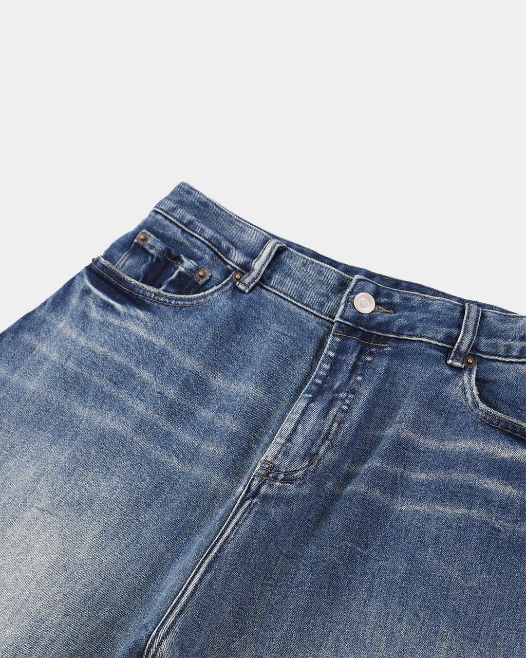 Vintage workwear jeans by Kaleb A. Bearden featuring classic denim fabric and rugged fit, suitable for work or casual wear.