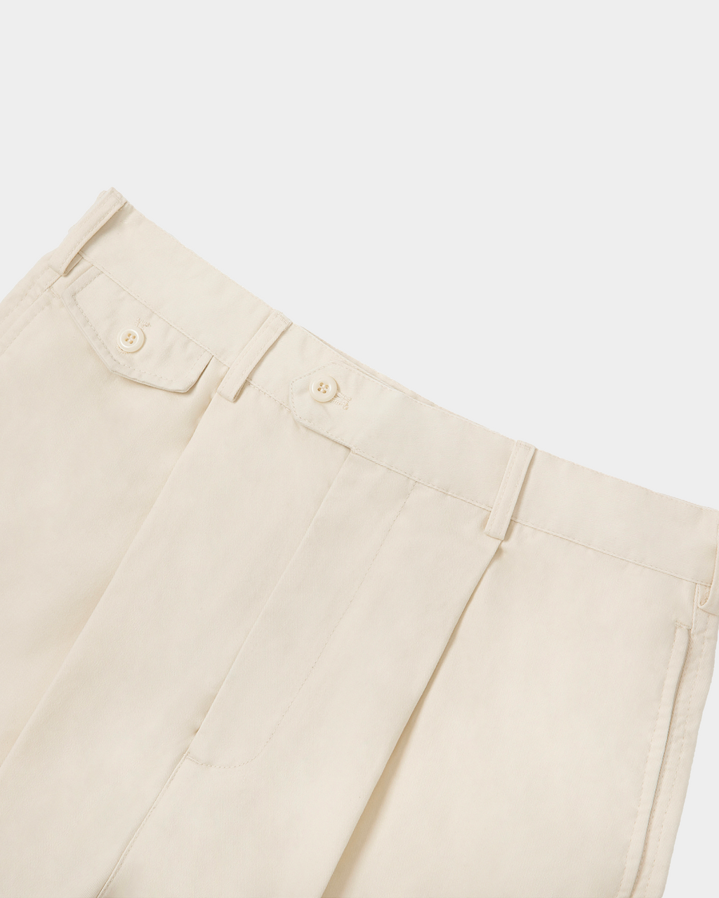 Kaleb A. Bearden pleated blue home trousers with relaxed fit and elastic waistband, shown on a hanger or model.