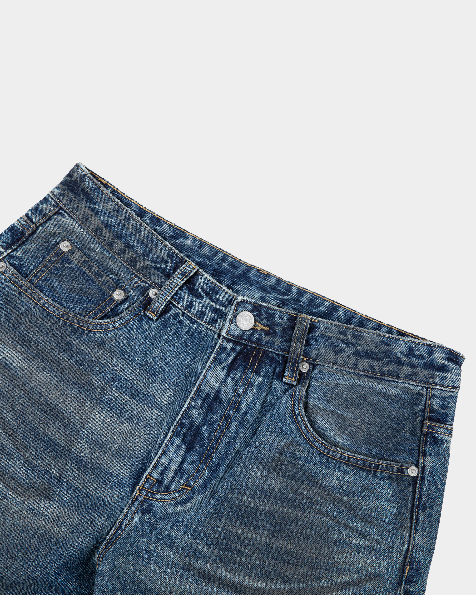 Kaleb A. Bearden Classic Heritage Denim Pants showing a close-up of blue denim fabric and stitching details.