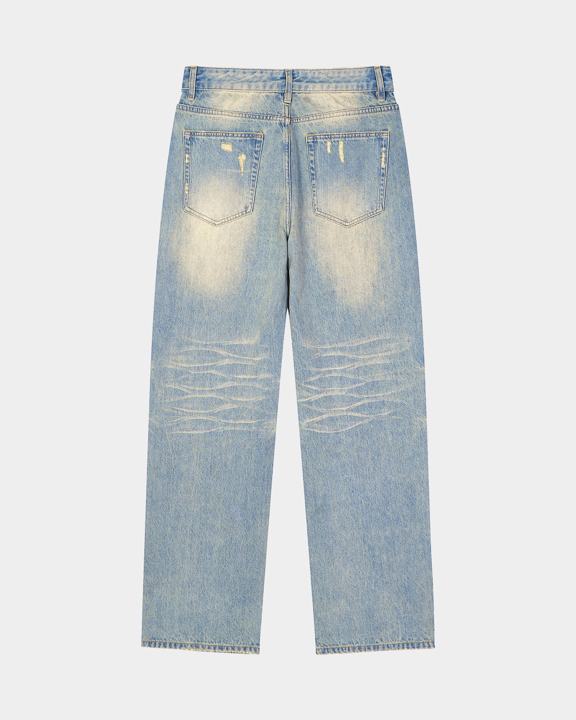 Sun-faded denim pants by Kaleb A. Bearden featuring a relaxed fit and distressed details on a casual style.
