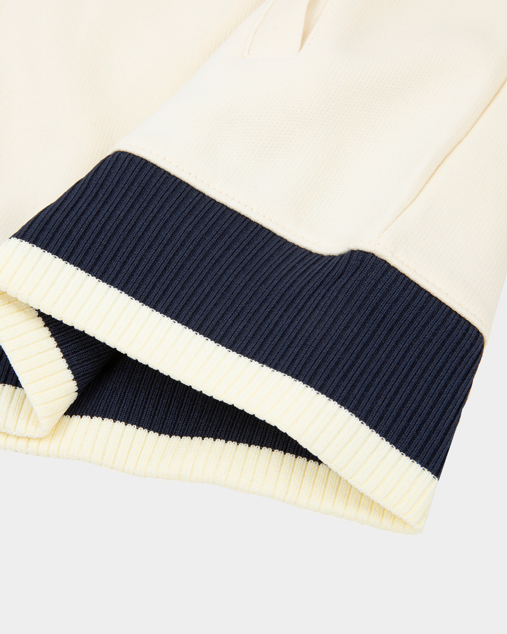 Kaleb A. Bearden Home Blues Track Jacket with blue and white athletic design, featuring front zipper and ribbed cuffs.