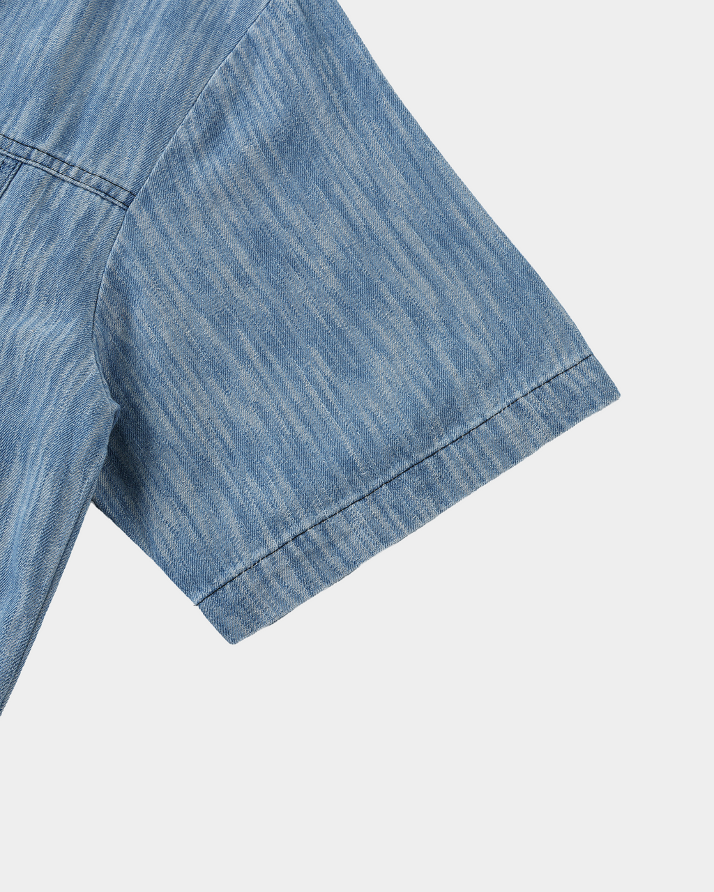 Washed denim panel shirt by Kaleb A. Bearden featuring a casual fit and front button closure with denim patchwork design.