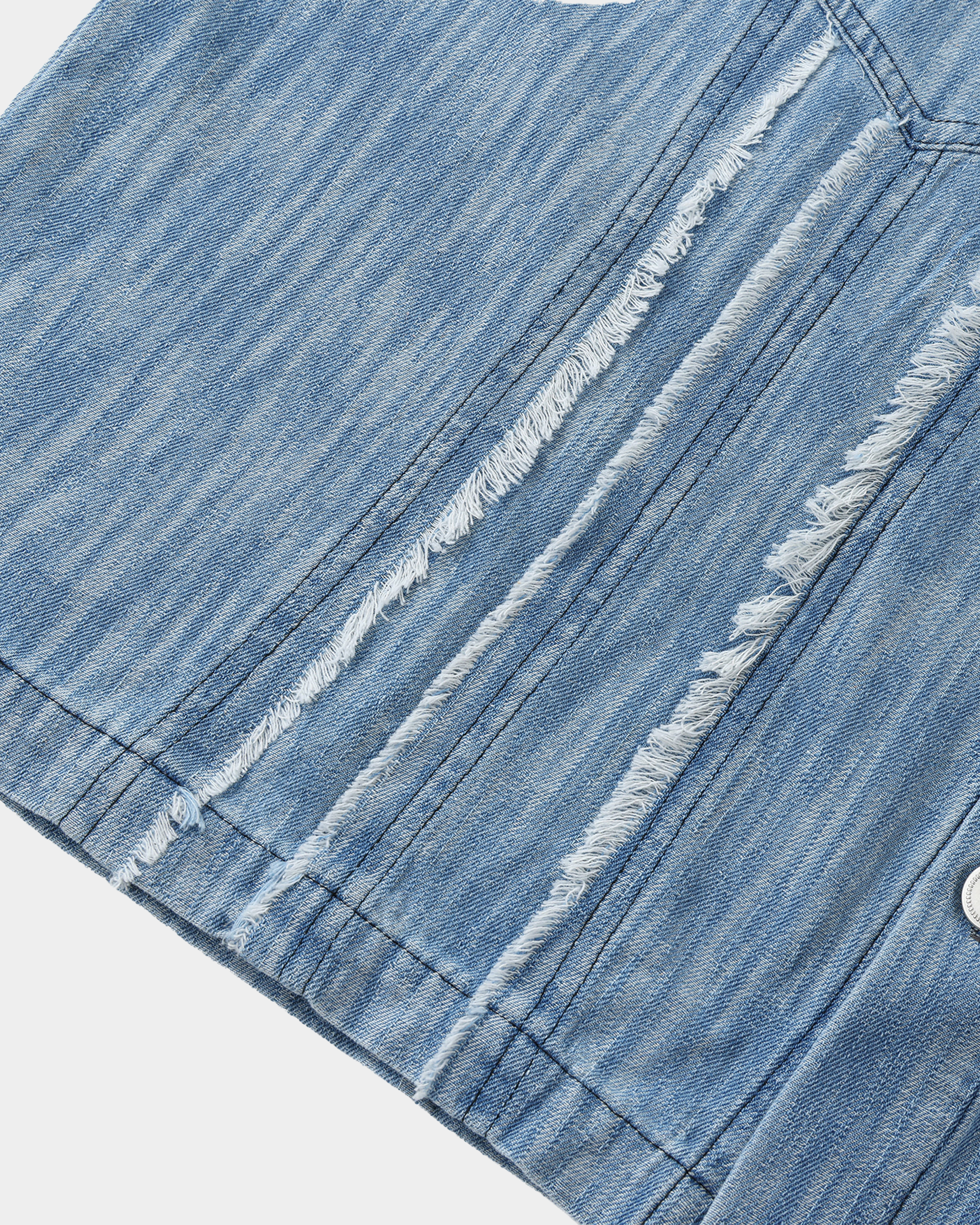 Washed denim panel shirt by Kaleb A. Bearden featuring a casual fit and mixed denim panels on a model.