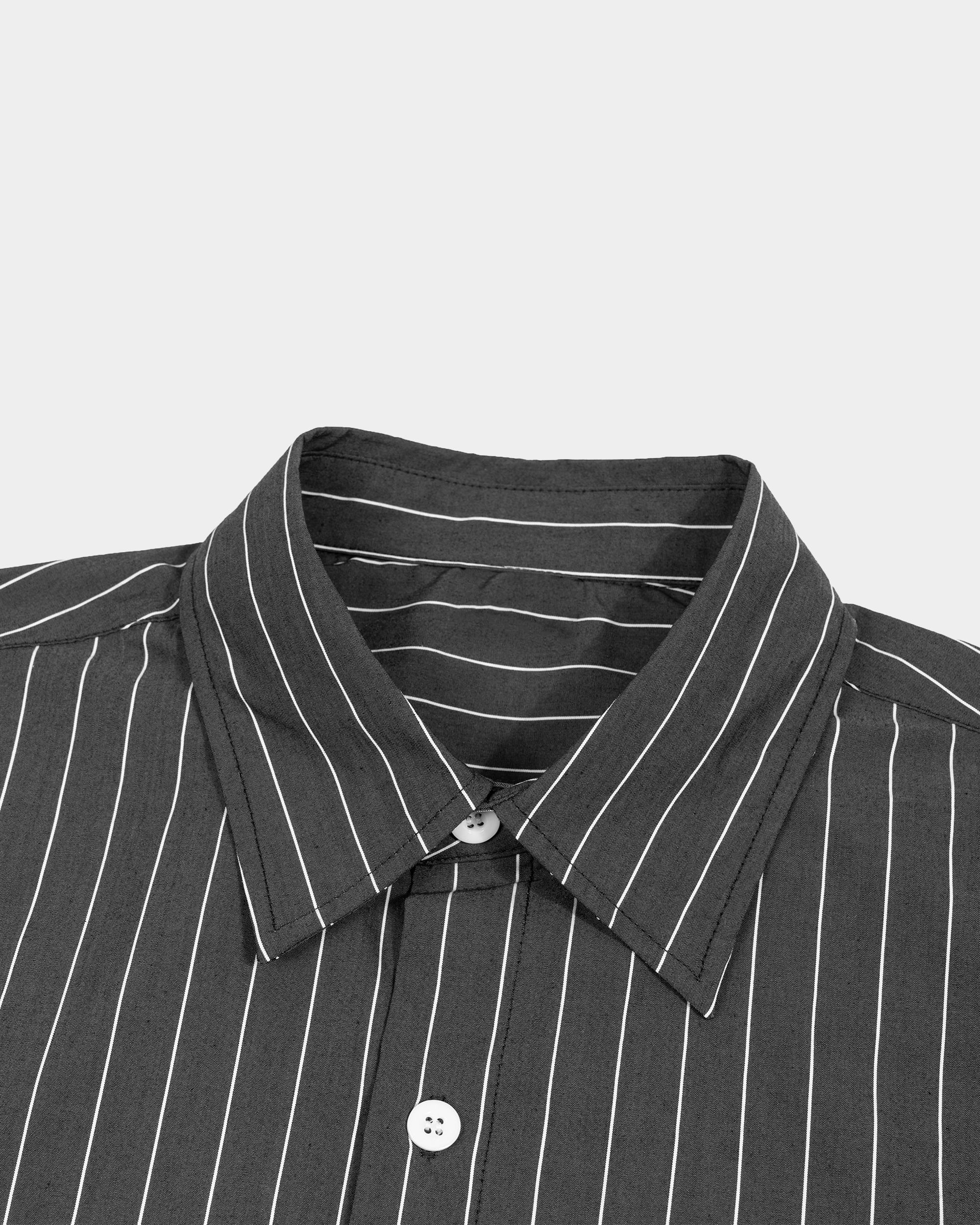 Kaleb A. Bearden pinstripe short sleeve shirt with a classic collar and button-up front, featuring thin white pinstripes on a dark fabric.