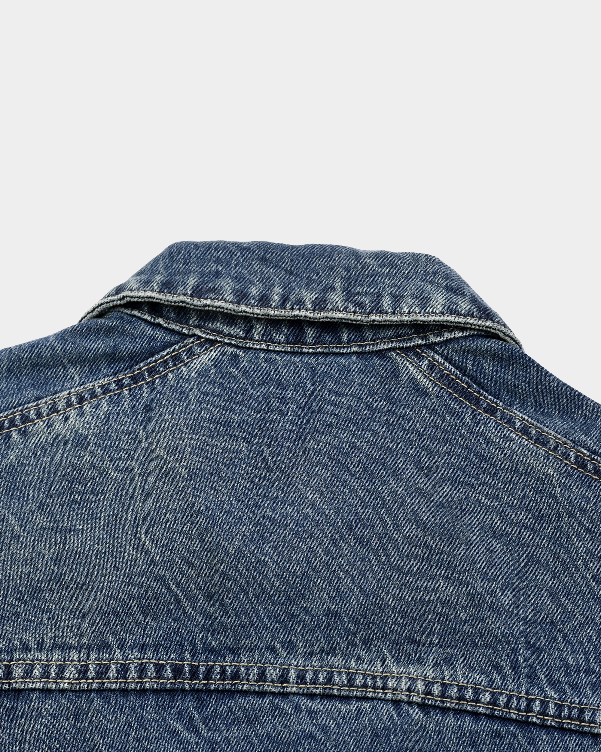 Washed denim jacket by Kaleb A. Bearden featuring a classic fit, light blue color, and casual style.