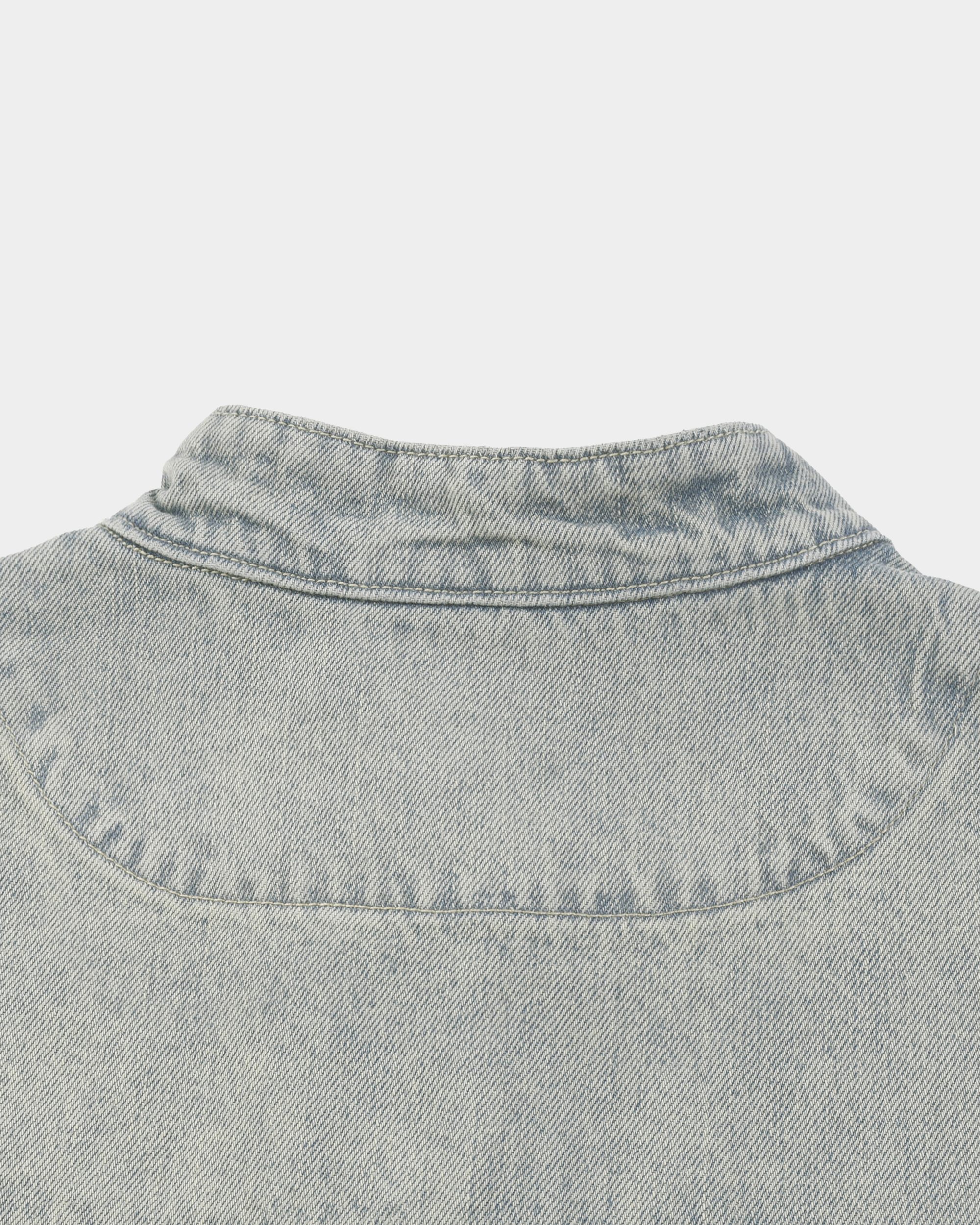 Vintage denim racing jacket by Kaleb A. Bearden with classic design, featuring a rugged denim exterior and racing-inspired details.