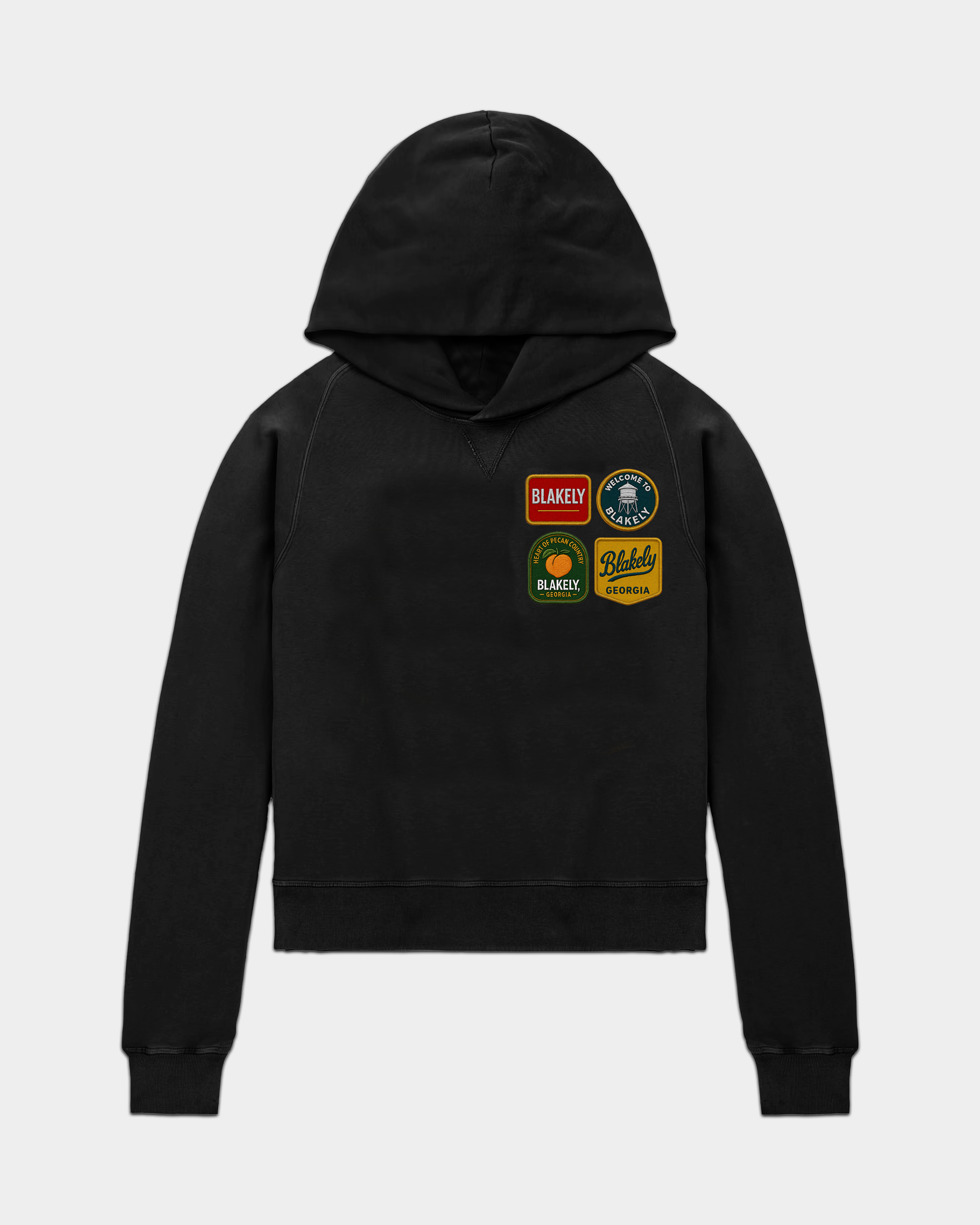 Bearden Rooted Patch Hoodie showing a cozy gray hoodie with a colorful patch on the chest and a drawstring hood.