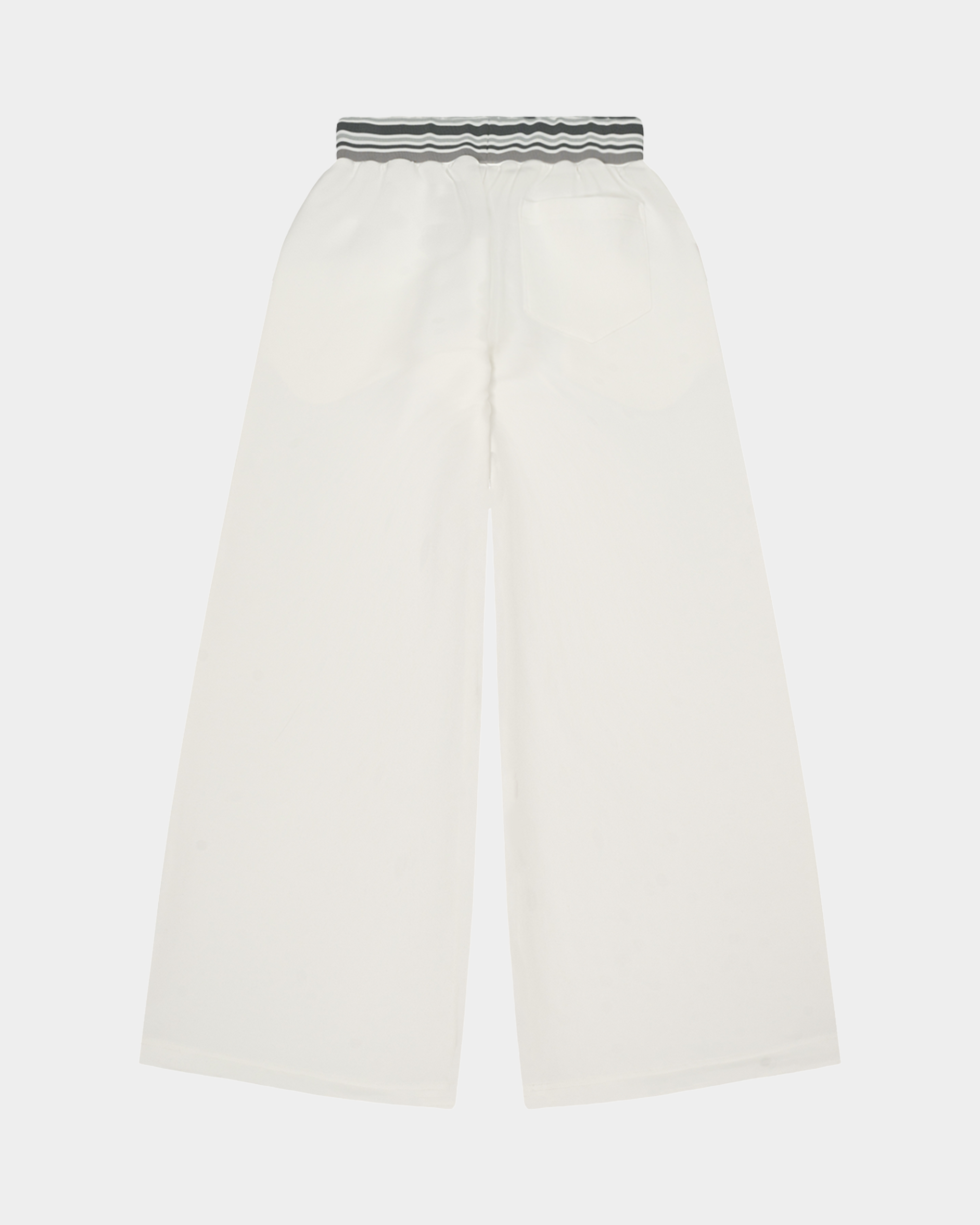 Kaleb A. Bearden Signature Track Pant showing side zipper pockets and tapered fit from a side angle.