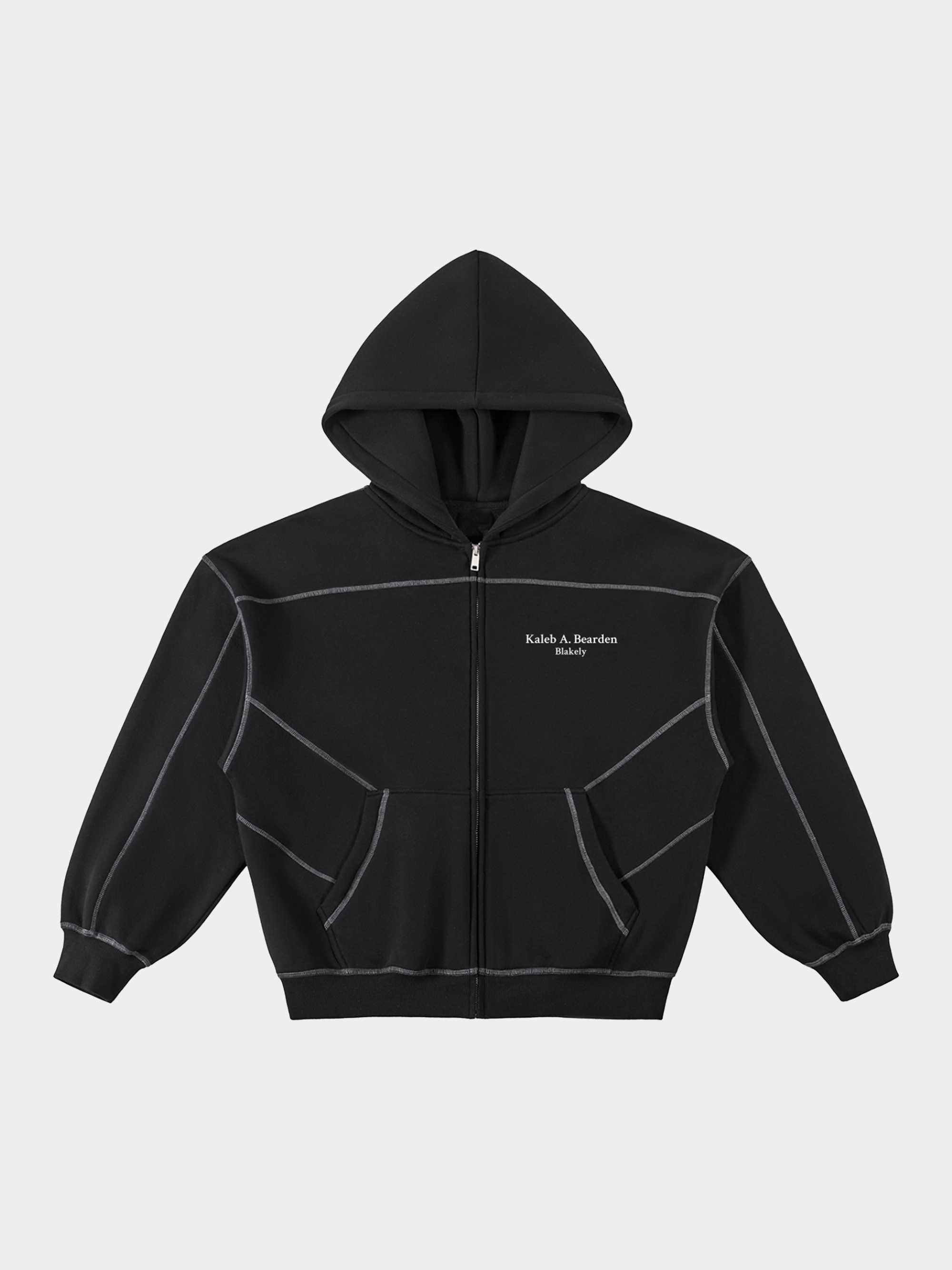 Kaleb A. Bearden Blakely Contrast Hoodie showing front view with black and white color block design and adjustable drawstring hood.